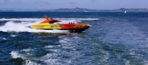 speedboat splashing through water