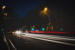 blur of speeding card on a nighttime highway