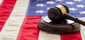 a gavel and ,allet on the American flag