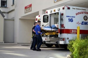 first responders load patient into the er