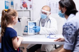 mother and child at the doctor's office for an x-ray