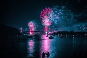 fireworks display over a waterway