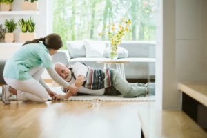 senior injured man fallen on floor