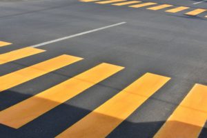 Pedestrian crossing lines on street