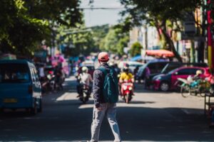pedestrian crossing the street