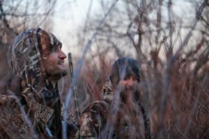 hunters hunting wild game