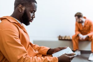 Two male inmates in a cell