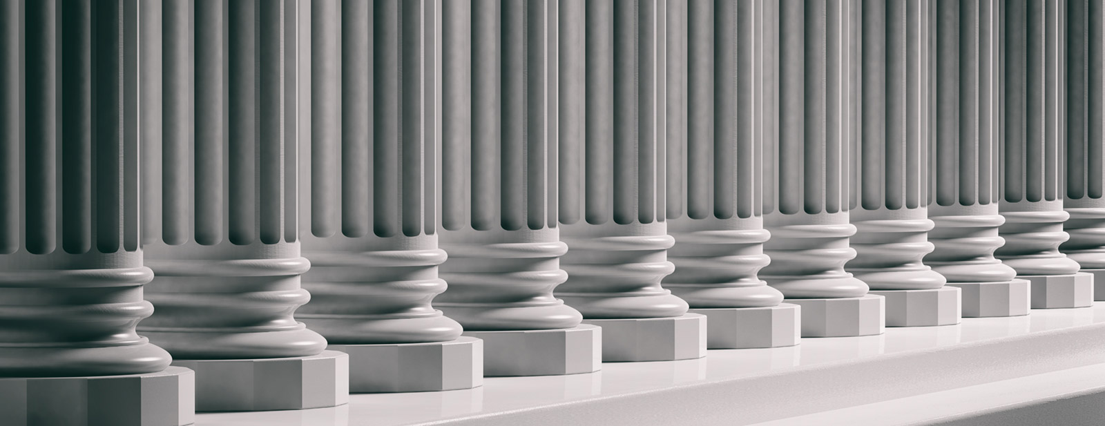 Line of white marble pillars