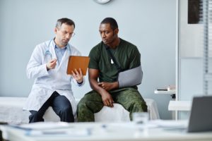 injured man speaking to doctor