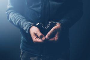 Rapist in handcuffs