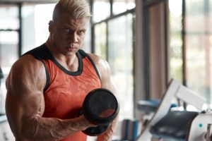 a man on steroids lifting weights