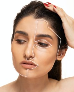 woman considering plastic surgery