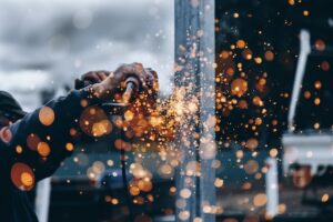 Metal worker with sparks  flying