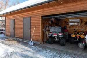 ATVs in a log cabin garage