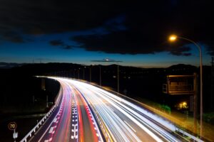 highway lit up at night