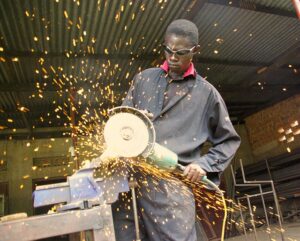 construction worker edging metal