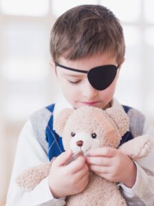 kid with eye patch