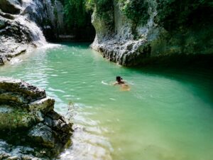 woman swimming in a river