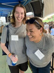 People in grey shirts laughing