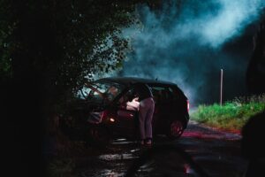 evening car crash in the woods