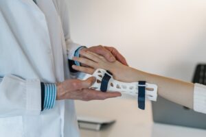 person being fitted with a hand cast