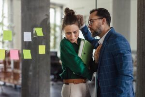 woman being asually harassed at work