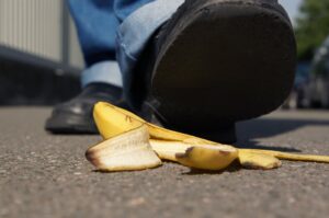 foot stepping on a banana peel