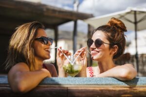 Ladies drinking in a hot tub