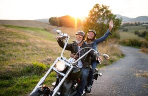 elderly couple on motorcycle