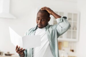 Man confused by legal paperwork