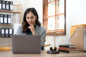 female lawyer looking at AI
