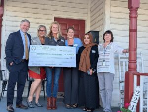 International Neighbors receives donation from Allen & Allen